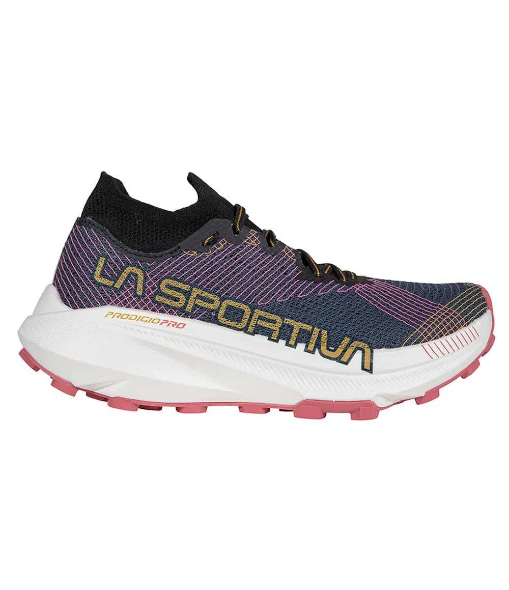 W Prodigio Pro running in a tundra area field - sports shoes