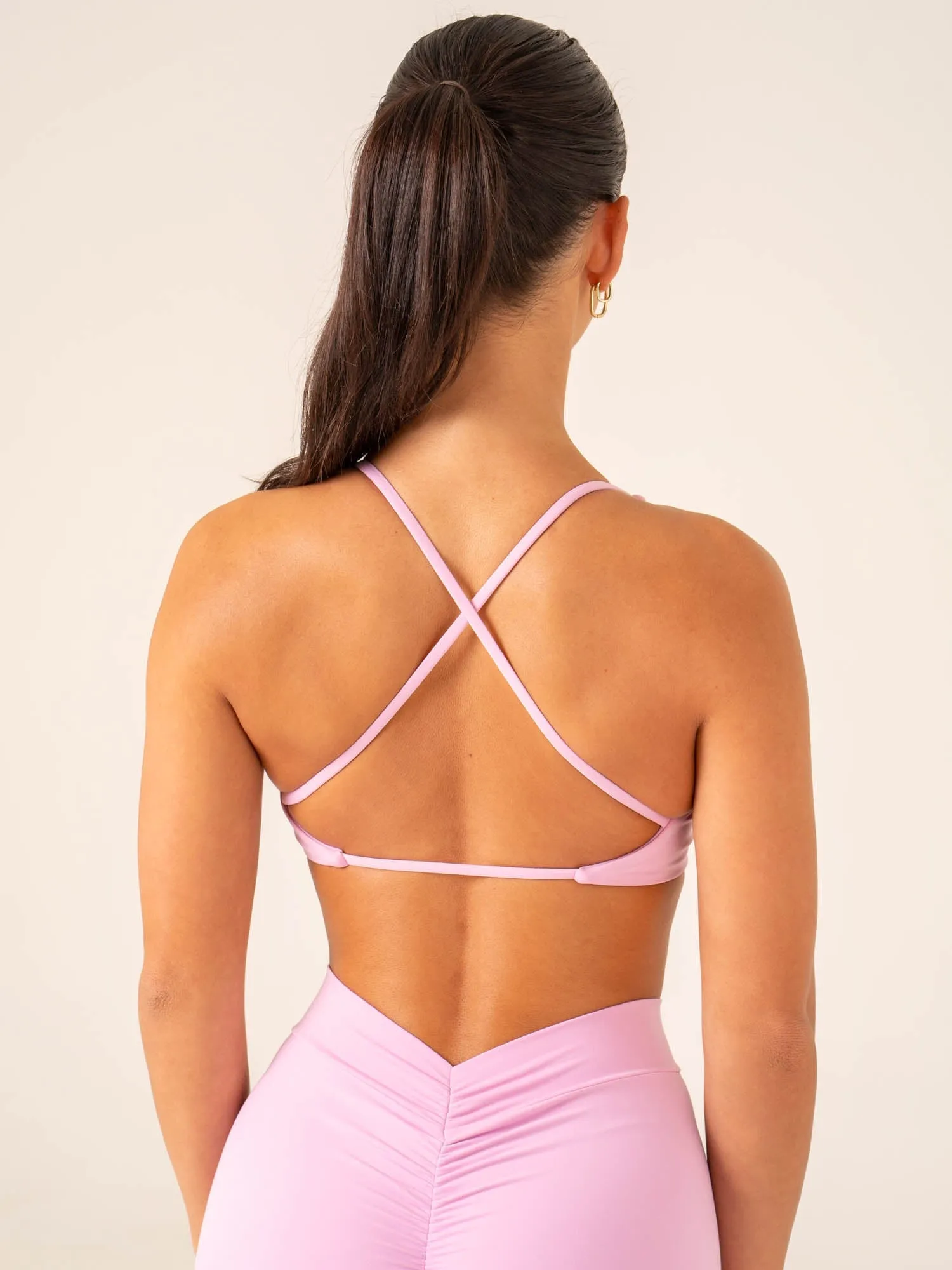 natural materials Versatile Strap Configuration NKD Twist Sports Bra - Candy Pink