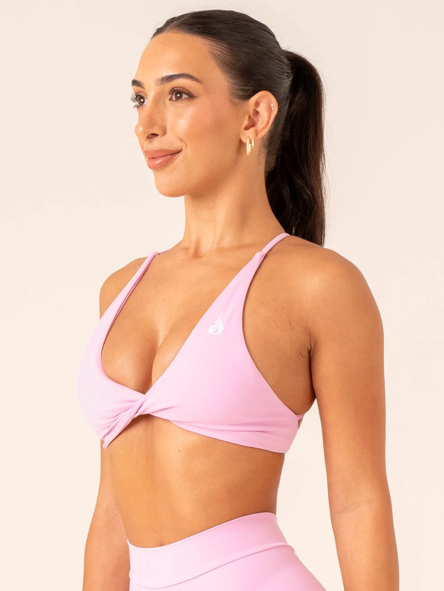 NKD Twist Sports Bra - Candy Pink Wear under clothes seams