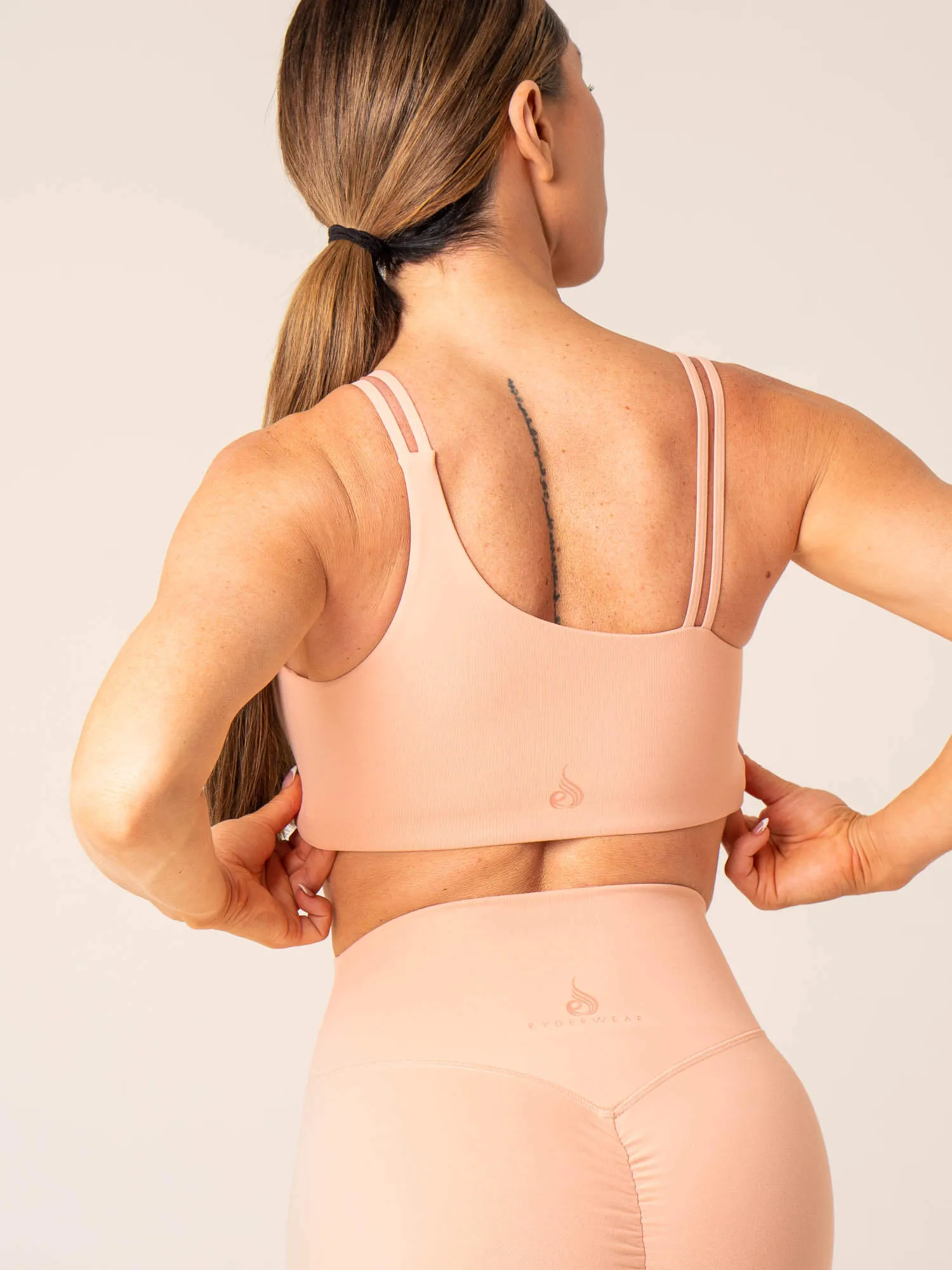 Unstoppable One Shoulder Sports Bra - Peach Friction Free Edging