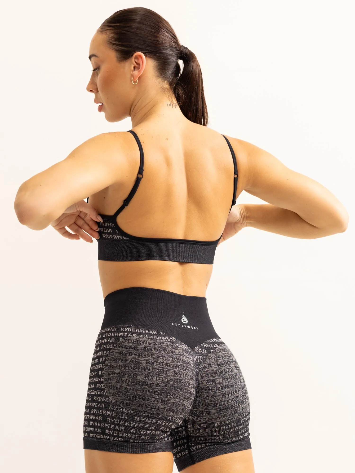 Logo Lux Seamless Sports Bra - Black Pressure Distributing Design Body-Conforming Fit