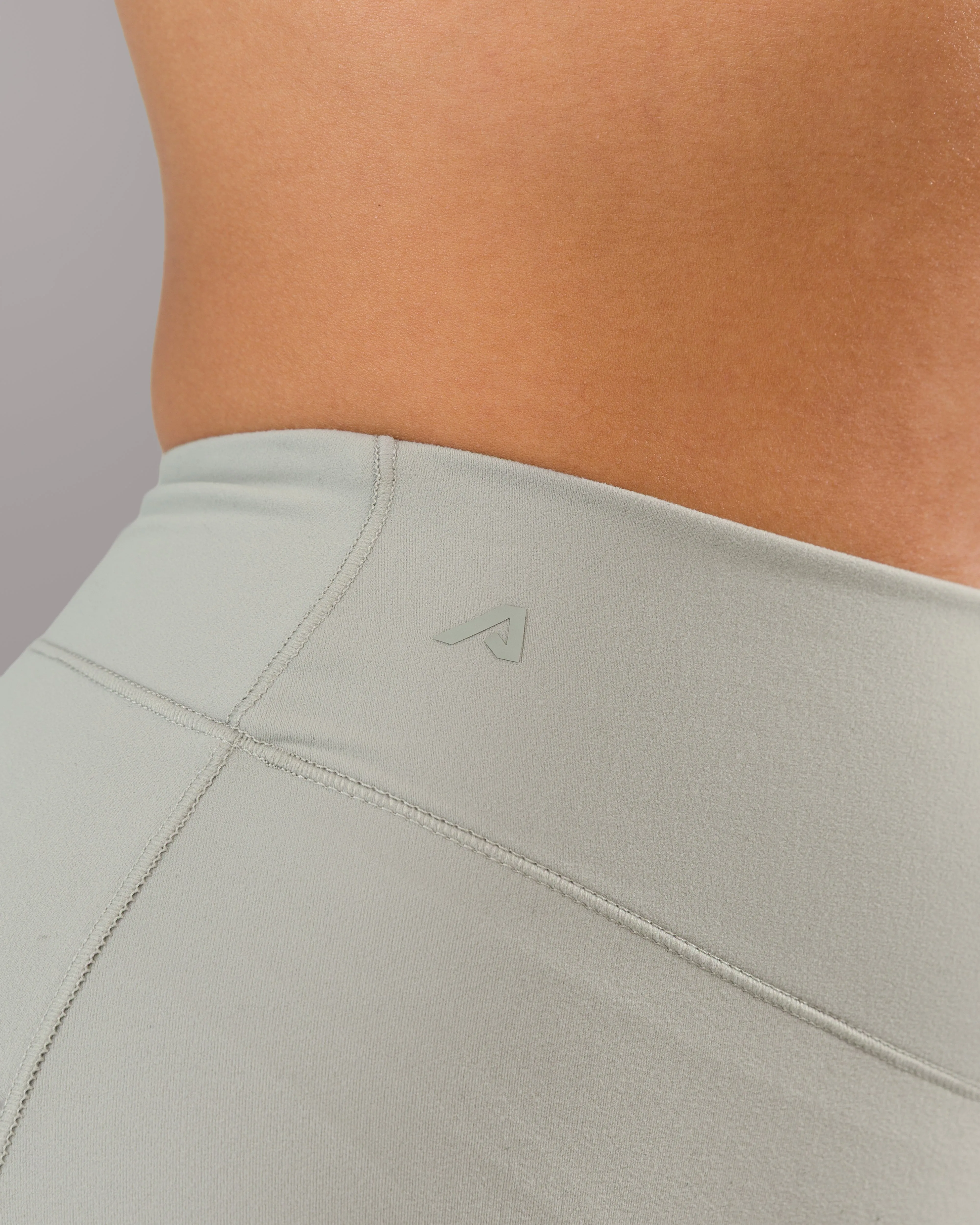 Soft Finish Flex Style Dip Back Short - Silver
