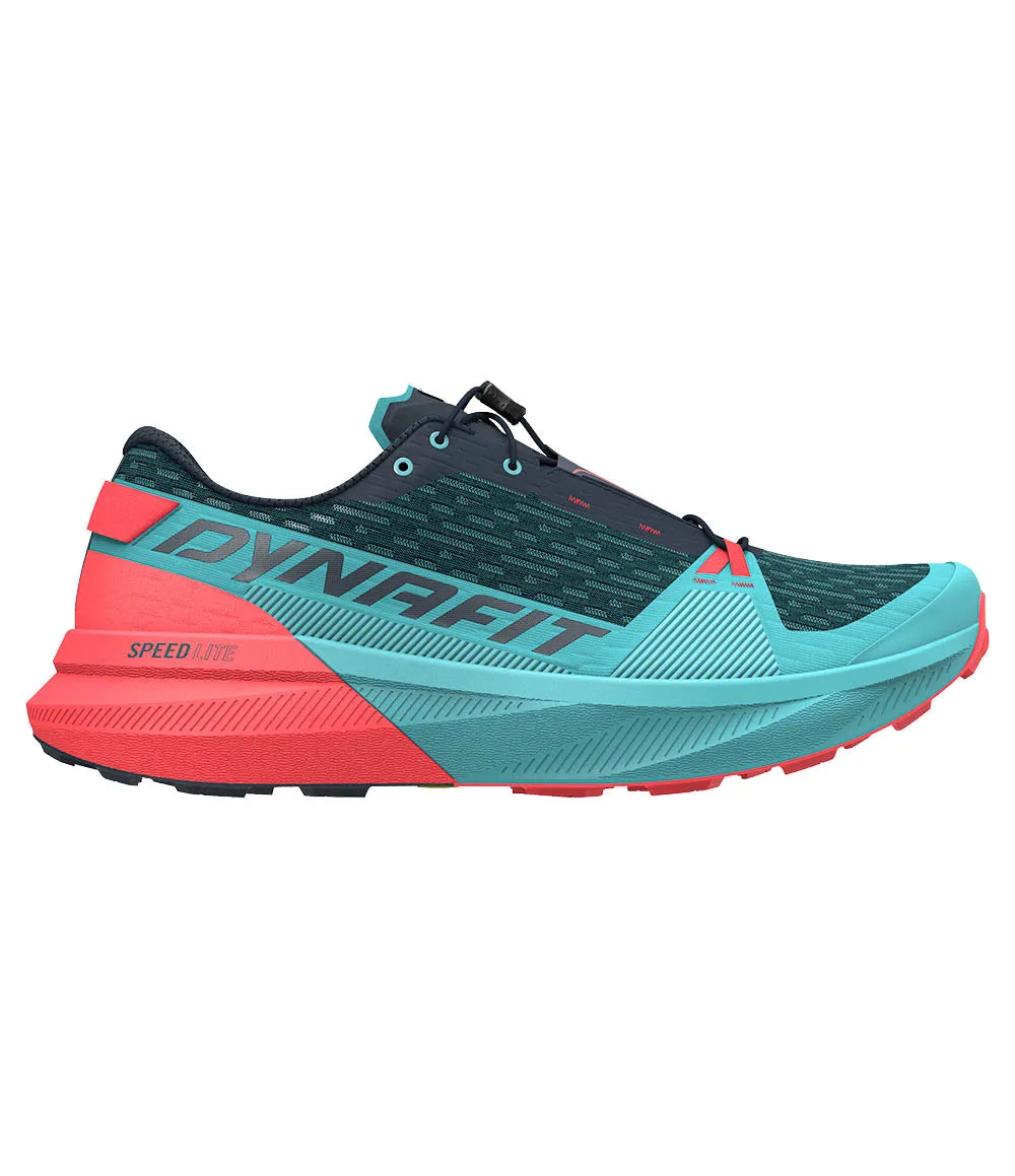 W Ultra Pro 2 running in a marsh area shoes track equipment