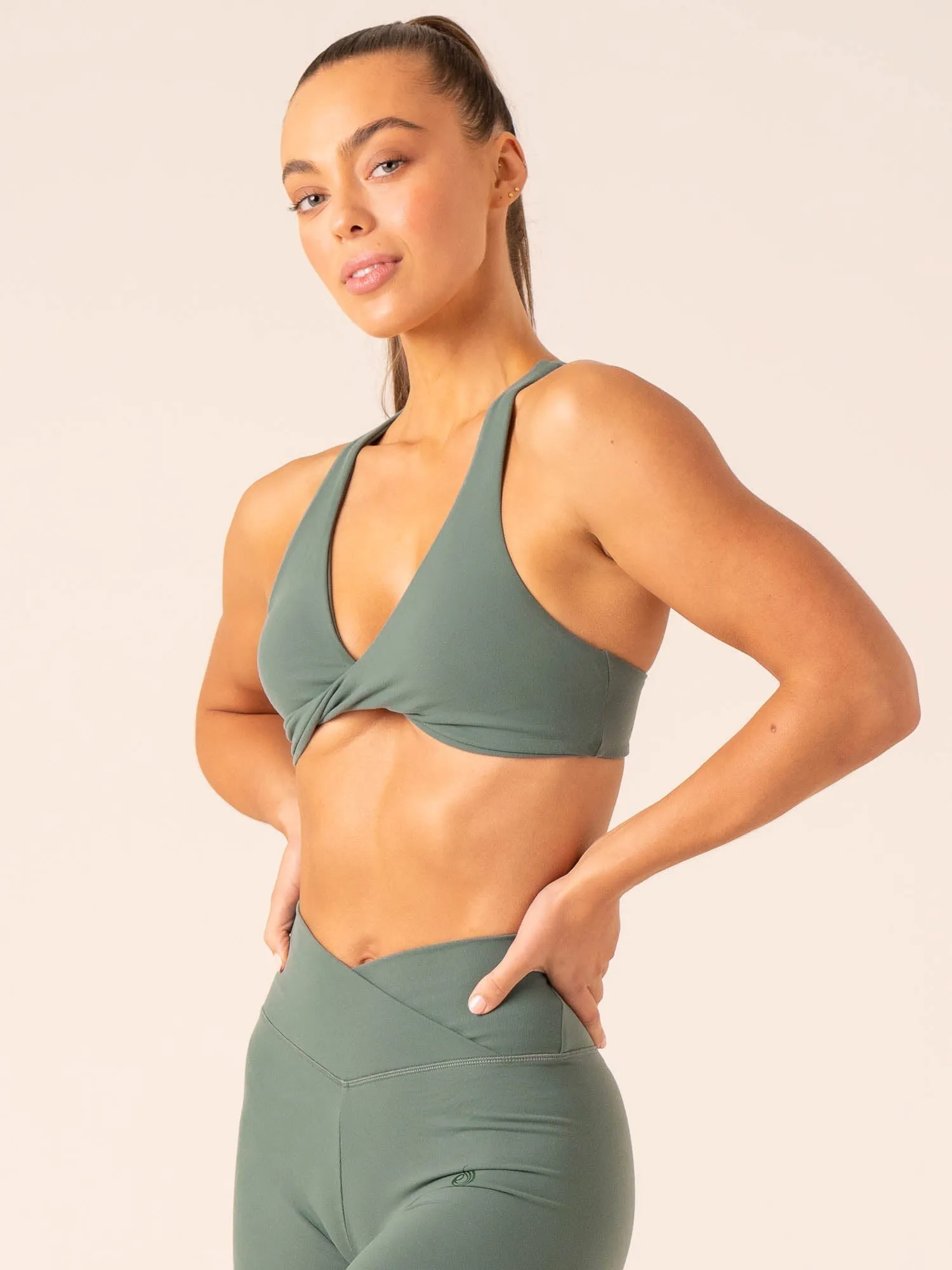 Momentum Twist Sports Bra - Forest Green Smooth Structure